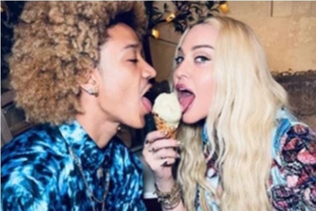 Madonna packs on some PDA with boyfriend Ahlamalik Williams while celebrating her 63rd birthday