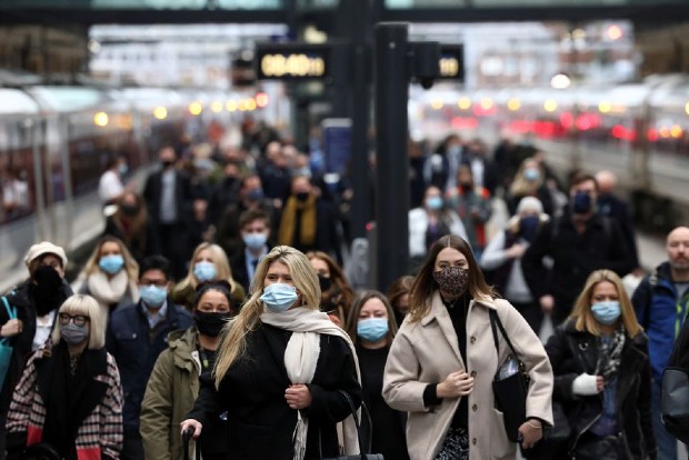 WHO chief scientist urges people not to panic over Omicron