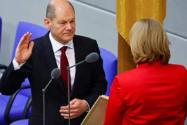 Scholz takes over as German chancellor, ending Merkel era