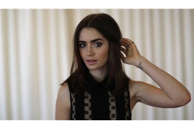 Lily Collins likens shooting Emily in Paris to a mini vacation