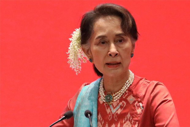 Myanmar charges Suu Kyi, giving legal basis to detain her
