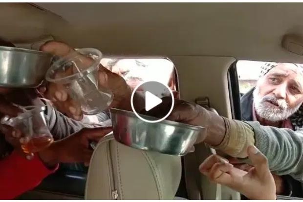 Old video falsely shared as farmers getting liquor