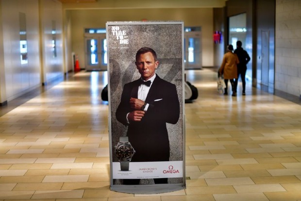 Theaters look to Bond and Black Widow to spark 2021 moviegoing