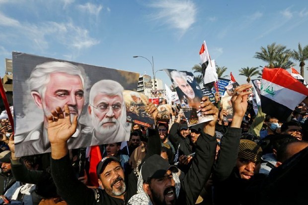 Chanting anti-U.S. slogans, Iraq militia supporters mark year since Soleimanis killing Chanting anti-U.S. slogans, Iraq militia supporters mark year since Soleimanis killing