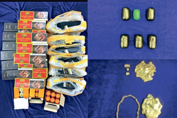 Duo smuggles gold, iPhones, cigarettes and liquor: Arrested