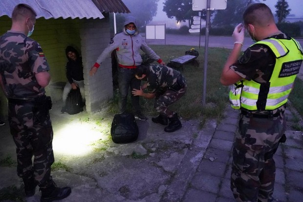 Lithuania says Belarus is flying in migrants, plans border barrier