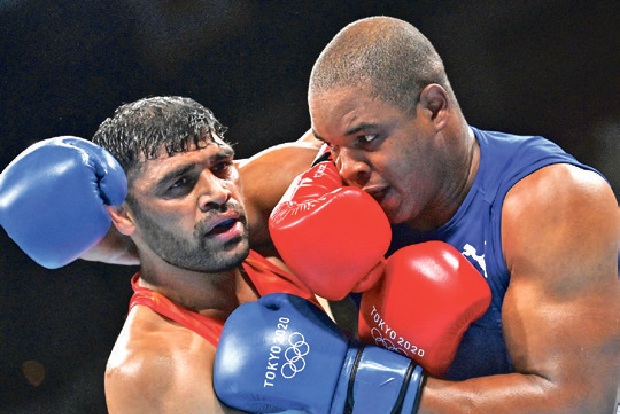 Satish enters last-8, Mary Kom knocked out
