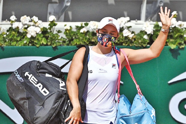 BARTY IS OVER: Injury forces former French Open champion to retire in the second round