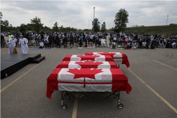 Muslim victims of truck attack given farewell with coffins draped in Canadian flags