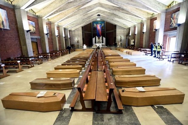 Italian priest recalls COVID-19 nightmare of coffin-filled church