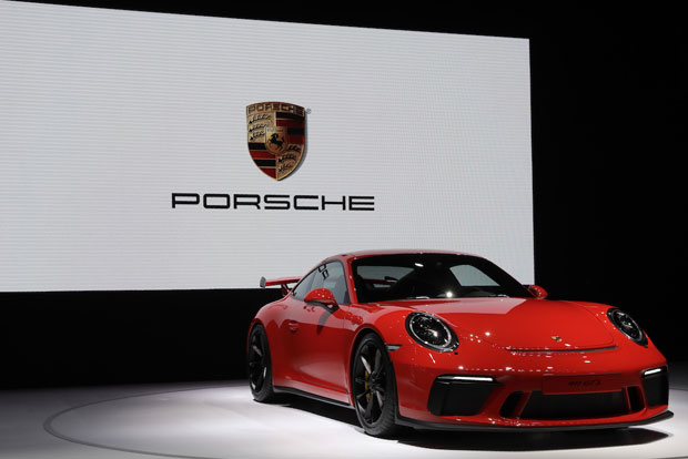 Germanys Porsche posts record revenues in 2020
