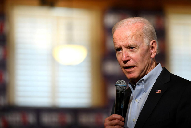 Biden calls state efforts to restrict voting sick