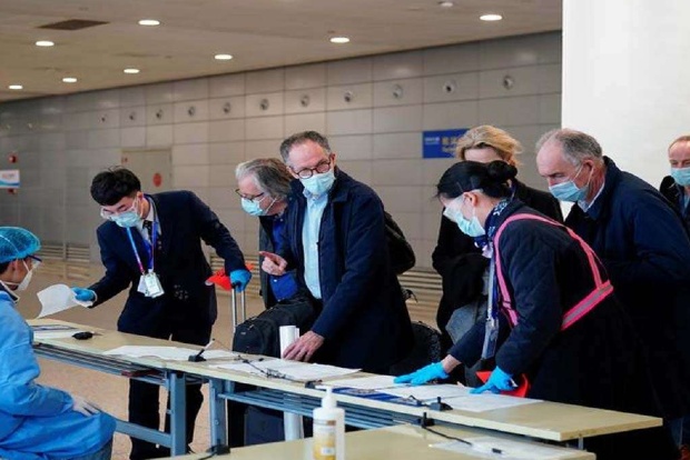 China outlines COVID-origin findings, ahead of WHO report