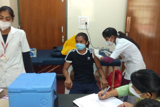 Hima Das gets first COVID-19 vaccine shot
