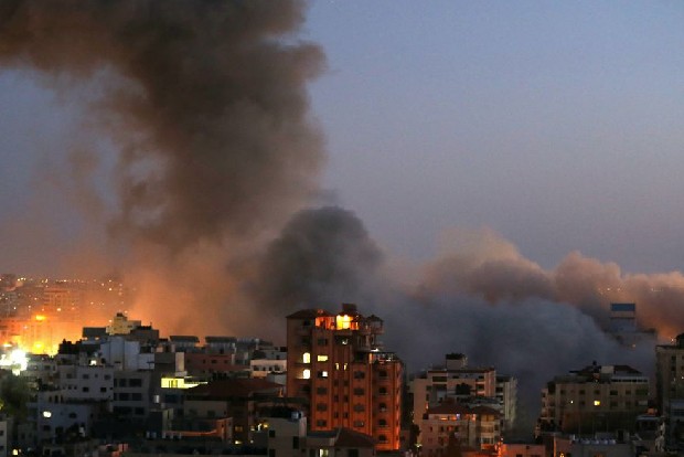 Gaza residential tower collapses in Israeli airstrike, witnesses say