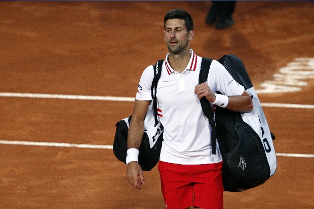 Djokovic loses cool, wins match against Fritz in Rome rain