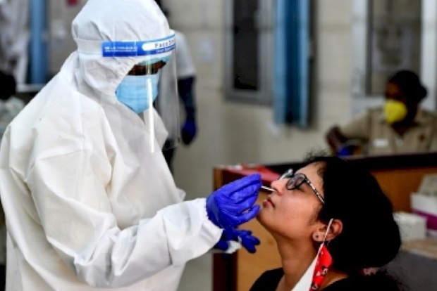 Delhi reports 13,287 new Covid cases, positivity rate below 18 pc