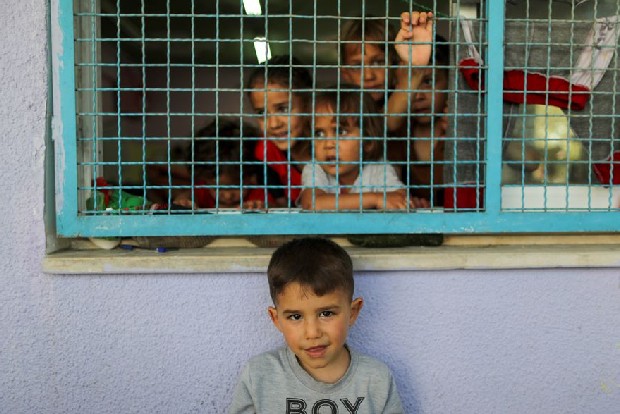 U.N. agency says 52,000 displaced in Gaza, Amnesty wants war crimes investigation