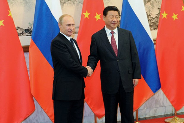 Xi, Putin witness launch of joint nuke energy project