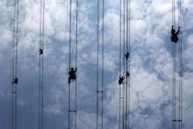 Chinas Guangdong orders factories cut power use as hot weather strains grid