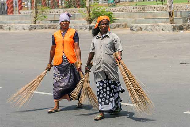 Cleanliness staff work without shoes, gloves, raincoats in Ambur