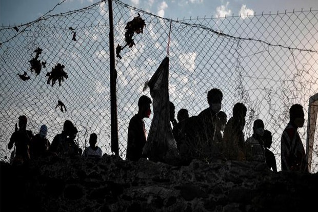 Poland uses water hoses at border, blames Belarus for attack