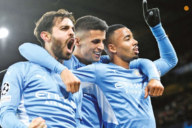 City qualifies with win: PSG, Real also in