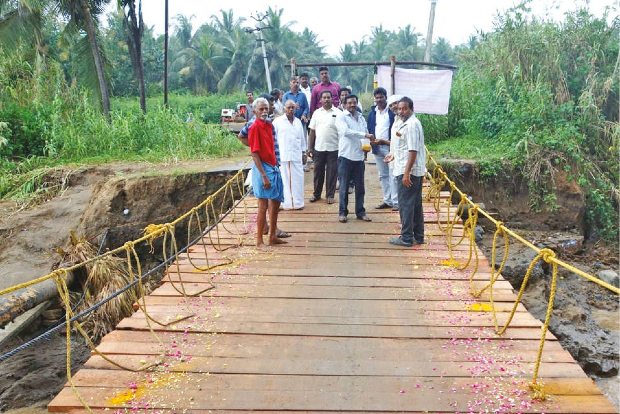 Community effort gets bridge for Seevur, thanks to floods