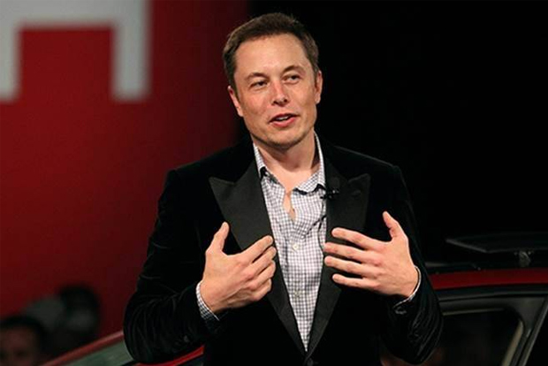 Musk tells staff to cut cost of delivering Tesla vehicles