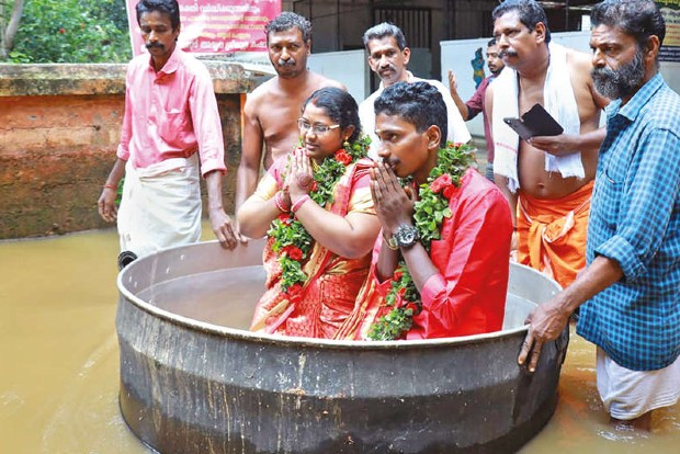 Couple braves flood, sails in a cooking vessel to get hitched