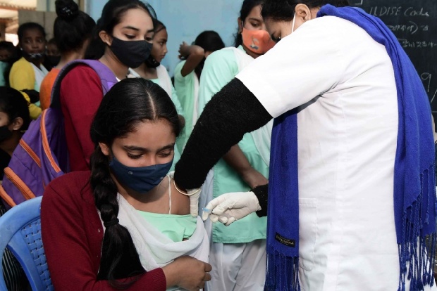 India vaccinates over 80pc eligible population with both doses