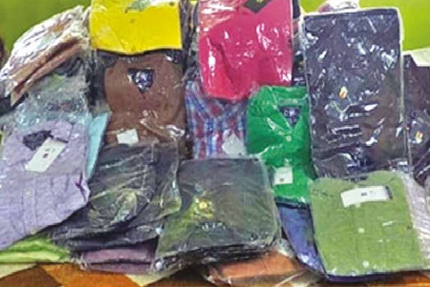Cops distribute seized duplicate branded clothes to shelter homes