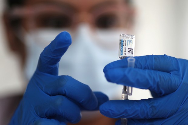 Group: Tax rich to fund vaccines for poor hit by pandemic