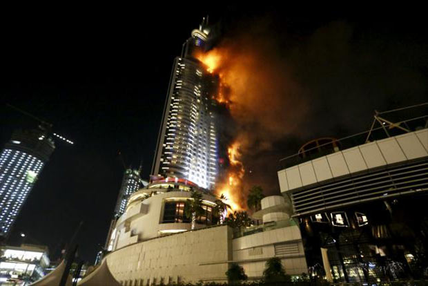 Dubai skyscraper fire rages through night