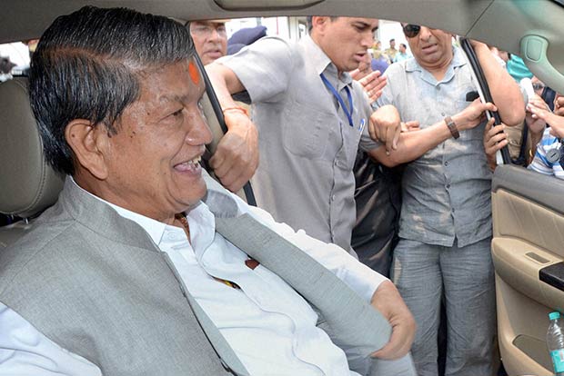End confrontational politics: Rawat