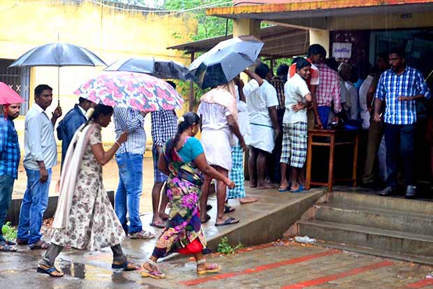Day-long rain, but high turnout in districts