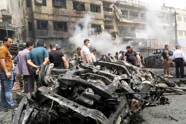 Suicide attacks kill dozens in Baghdad