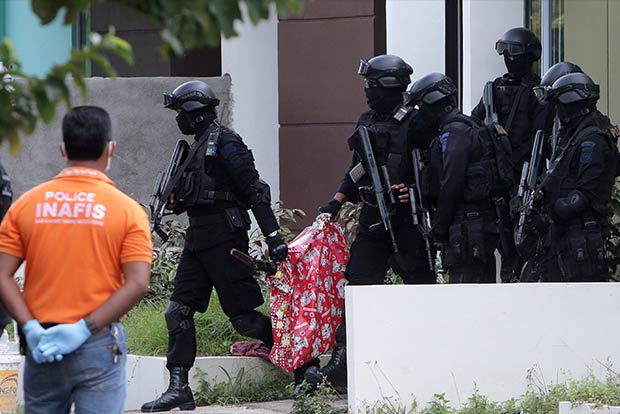 Six arrested for plotting attack on Singapore