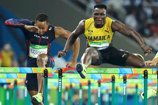 McLeod sprints to hurdles gold