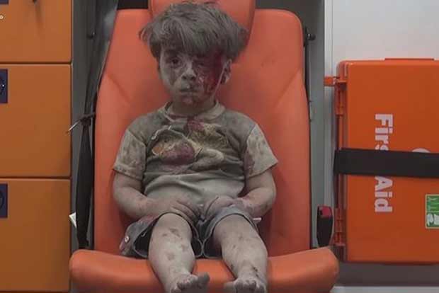 Boy rescued from Aleppo rubble turns icon of Syrian conflict
