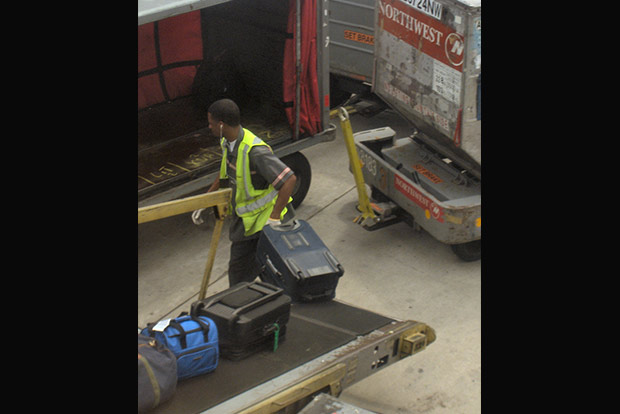 Eight loaders held for theft of valuables from check-in baggage