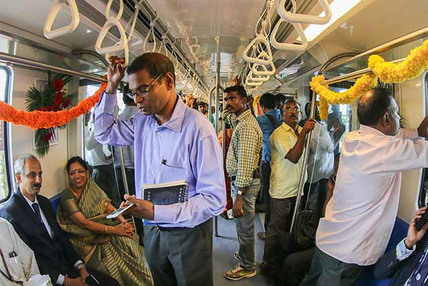 Passengers enjoy their first ride of the new Metro stretch