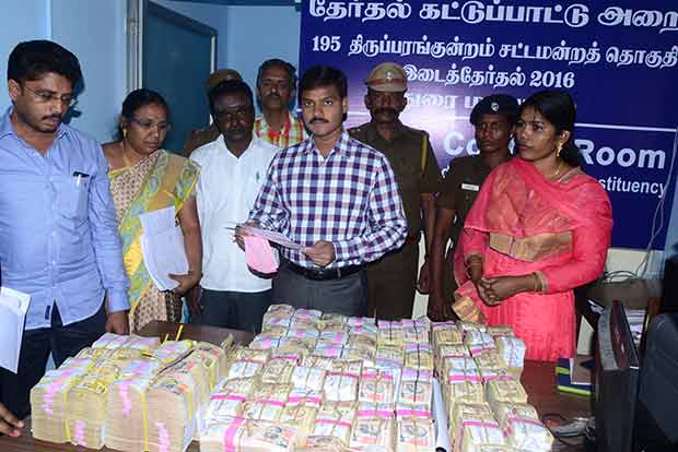 Election officials seize unaccounted bank cash