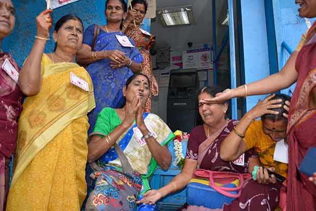 Women garland ATM that ran out of cash