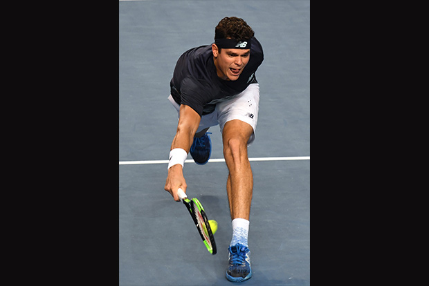 Top surviving seed Raonic enters quarters