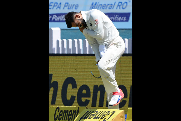 Kohli injures shoulder, scan reports awaited