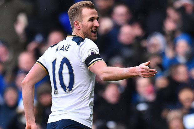 Milestone man Kane keeps Spurs in hunt