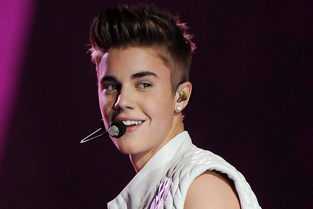 Biebers day out: Enjoys coffee, greets fans from his car