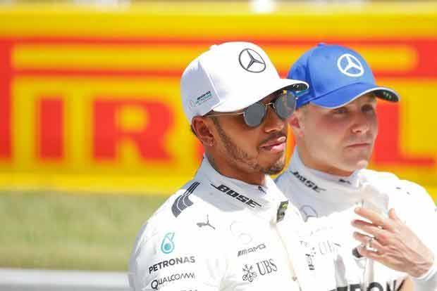 Lewis Hamilton takes pole position at the Spanish Grand Prix