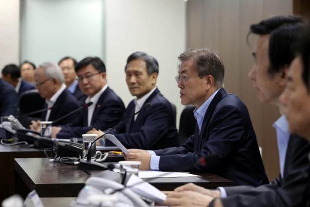 North Korea tests missile, challenges Moon
